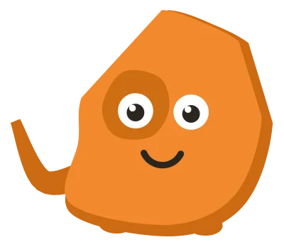 An orange Snip with a darker patch marking one eye and a tail hooked up behind it.
