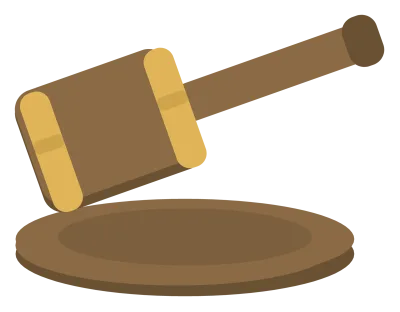 A wooden gavel resting on its round sound block, with brass bands at both ends of the head.
